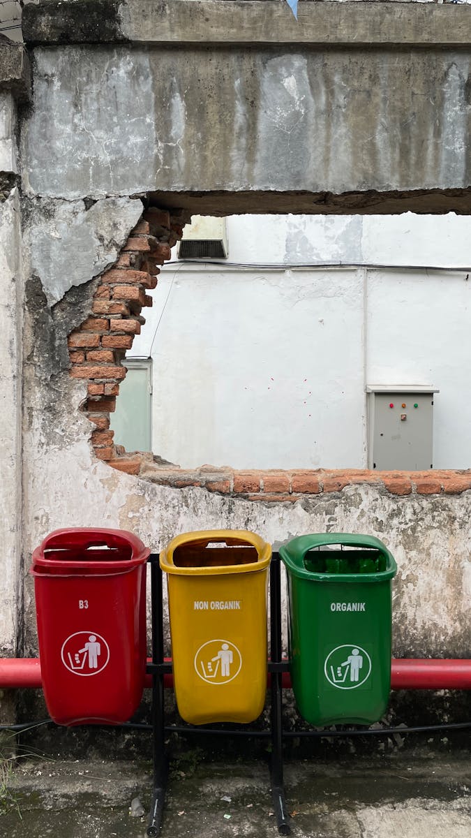 A Three Trash Bins