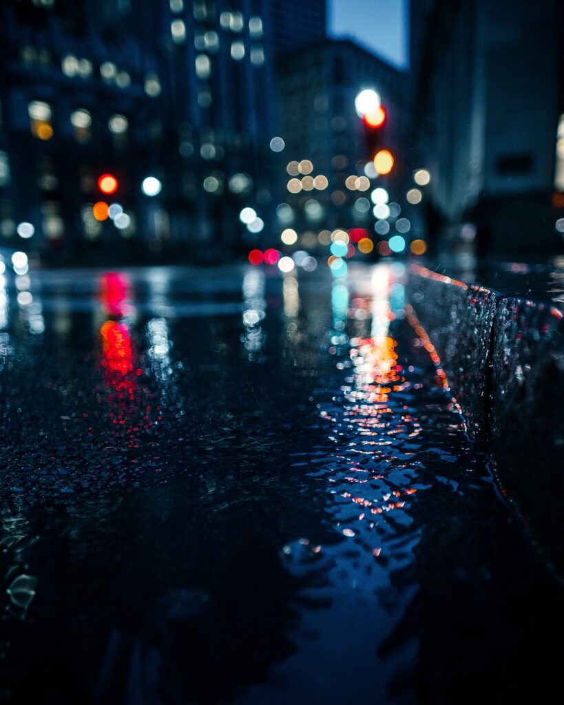 bokeh lights, nature, wet, gutter, street gutter, street, pavement, sidewalk, bokeh, lights, night, dark, urban, city, city lights, night photography, street photography, rain