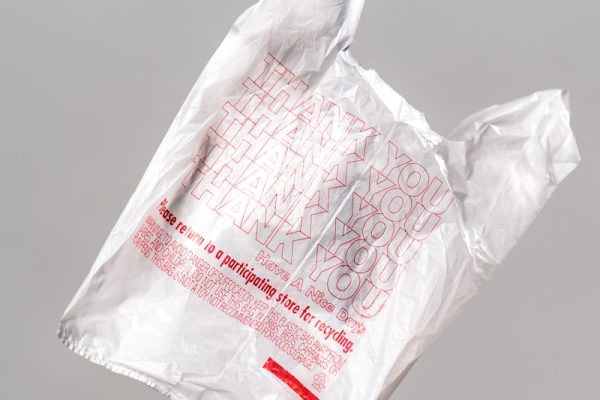 white plastic bag on white table