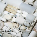 A pile of assorted recyclable plastic containers highlighting the issue of plastic waste.