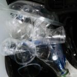 Close-up of plastic waste in a recycling bin, highlighting environmental concerns.