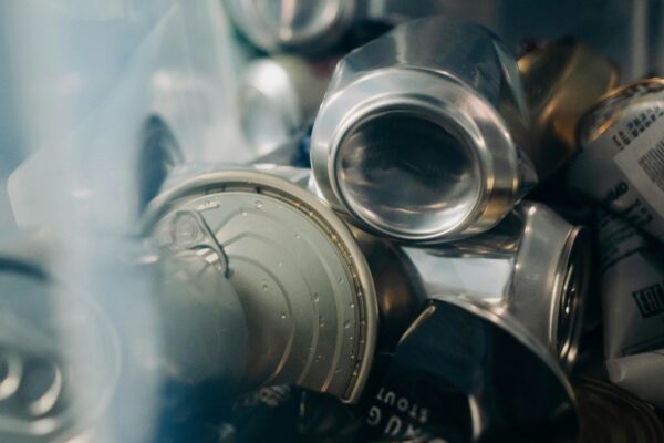 An assortment of tin cans ready for recycling. Eco-friendly waste management concept.