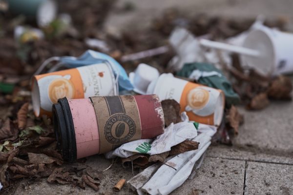 a couple of cups that are on the ground