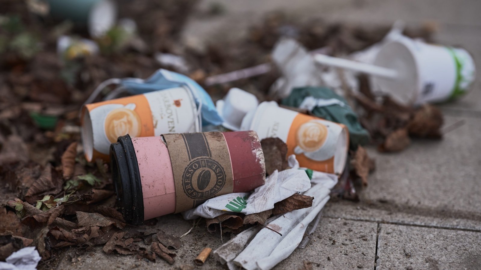 a couple of cups that are on the ground